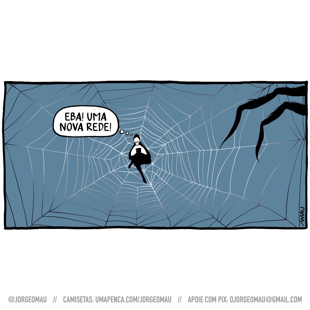 charge - uma pessoa está sentada, de pernas cruzadas, olhando para o celular. Está escuro e o brilho da tela cria sombras nela. Acontece que ela está sentada no centro de uma teia e à direita do desenho aparecem duas enormes pernas de aranha. A pessoa pensa: eba! uma nova rede!